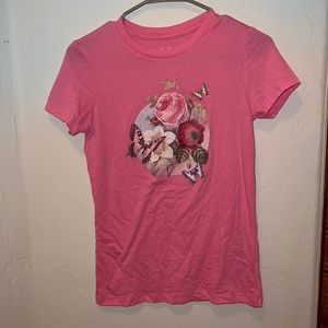 Flower on pink shirt